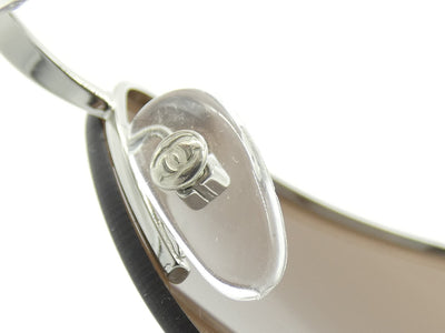 Chanel Brown Camellia Flower Rimless CC Sunglasses 4135 Sunglasses Chanel